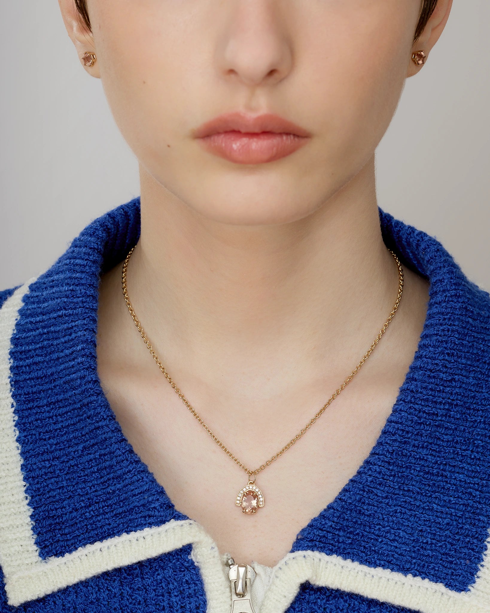 Oval Sunstone Pendant in Fairmined 14K Yellow Gold adorned with lab-grown diamonds
