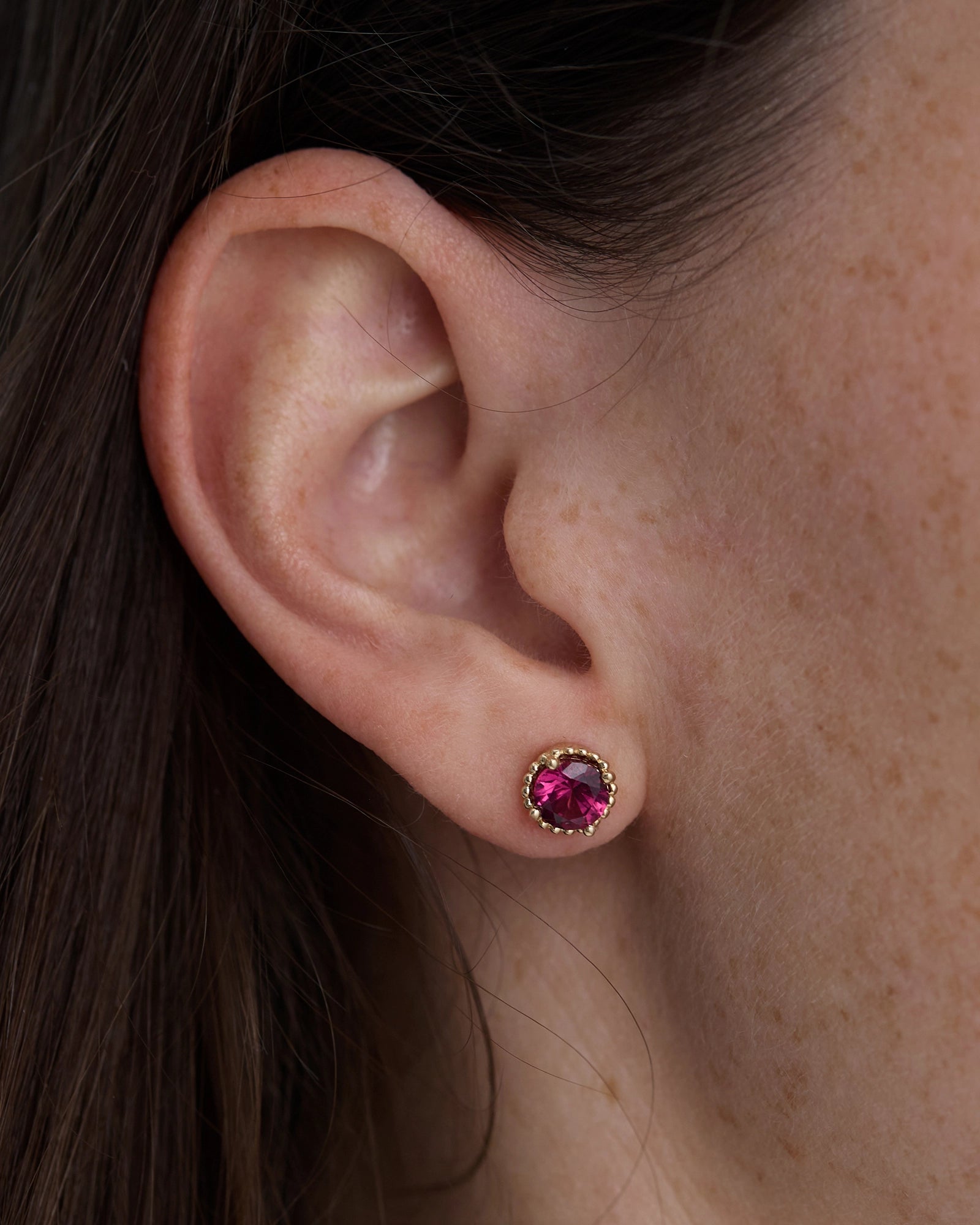 Galatée Stud Earrings in 14k Yellow Gold with raspberry-toned Tanzanian Moyo Garnet