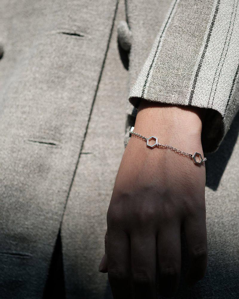 Three hollow hexagon charms on Silver Chain braceletEssaim Bracelet in Silver Worn